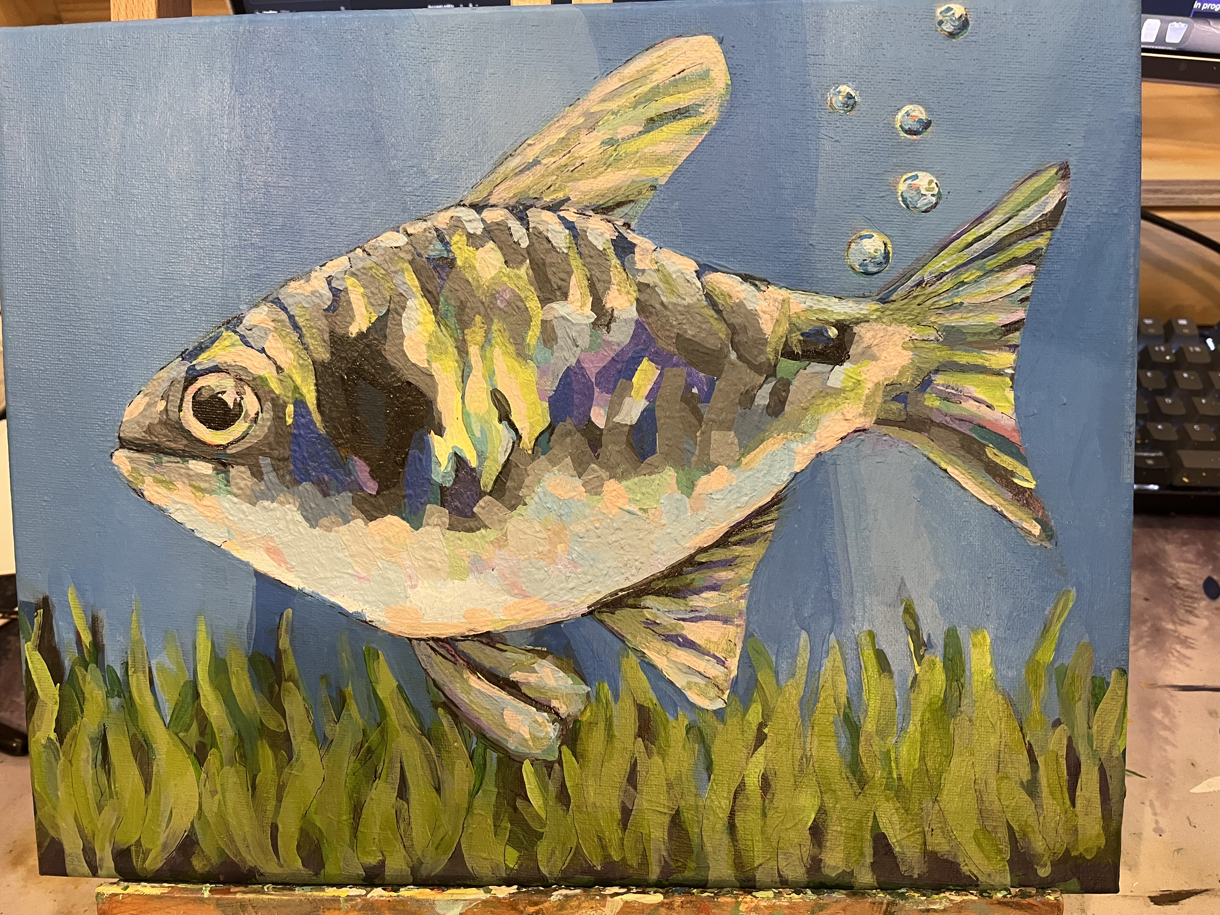 Fish in office aquarium — bubbles relocated for comedic effect